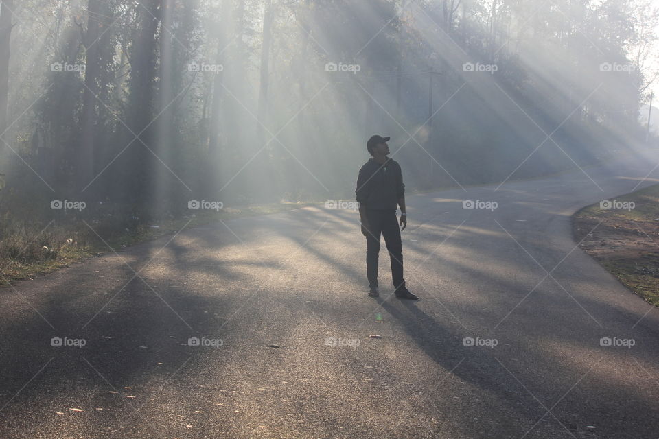 Silhouette of a man & foggy morning