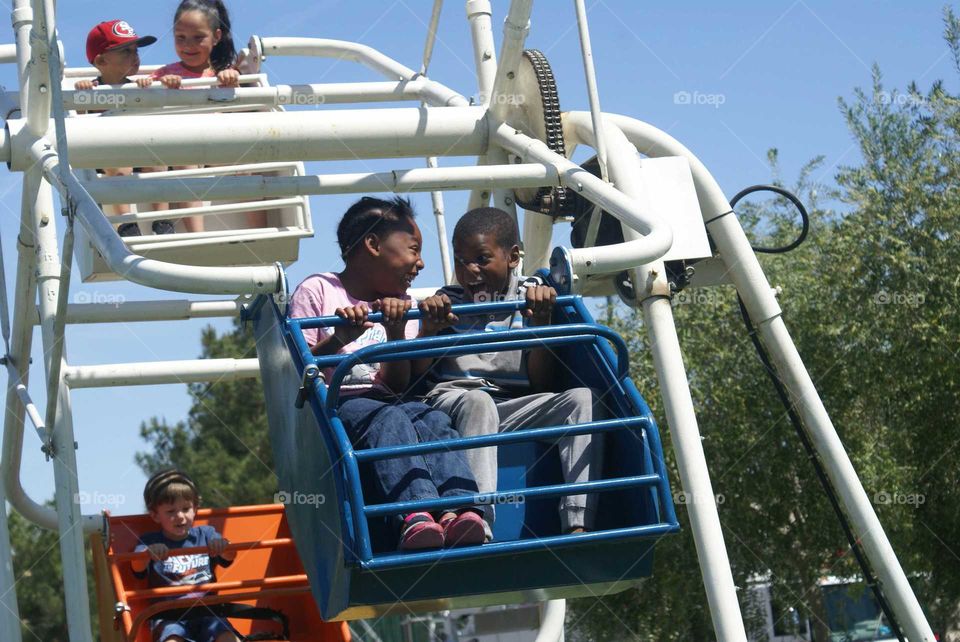 kids on Ferris wheel