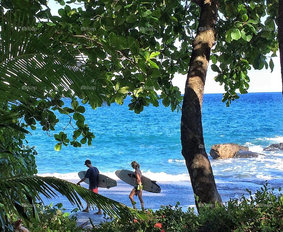 Walking the beach after a long day on the board in Montezuma Costa Rica