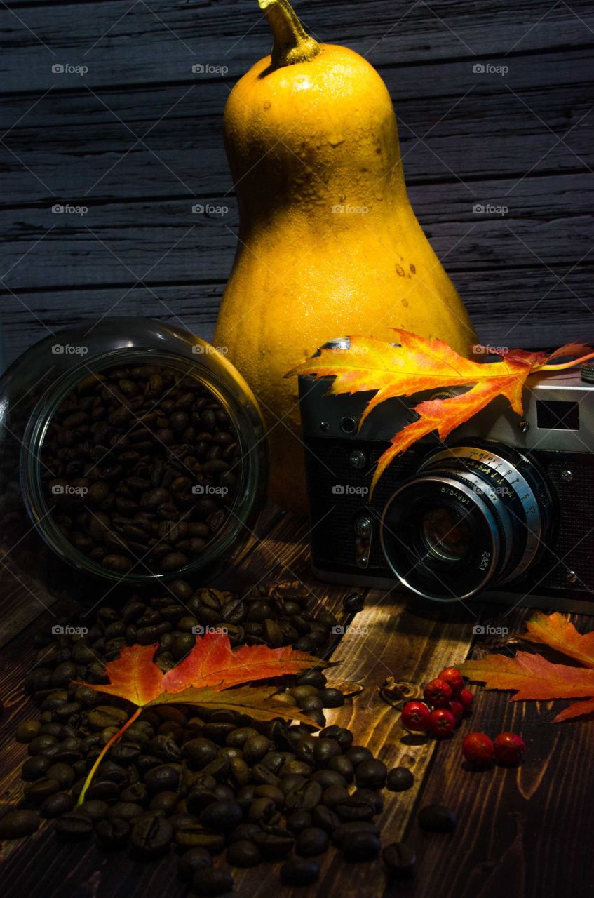 coffee been still life on wooden background