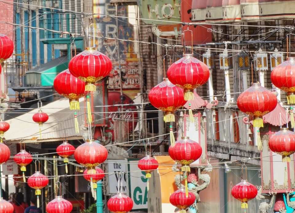 Chinese New Year Paper a Lanterns Hanging Above City Streets