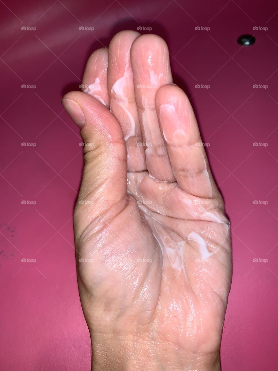 Moisturizing cream and lotion on my hand