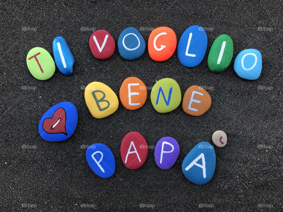 Ti voglio bene papà, italian father's day celebrated on colored stones 