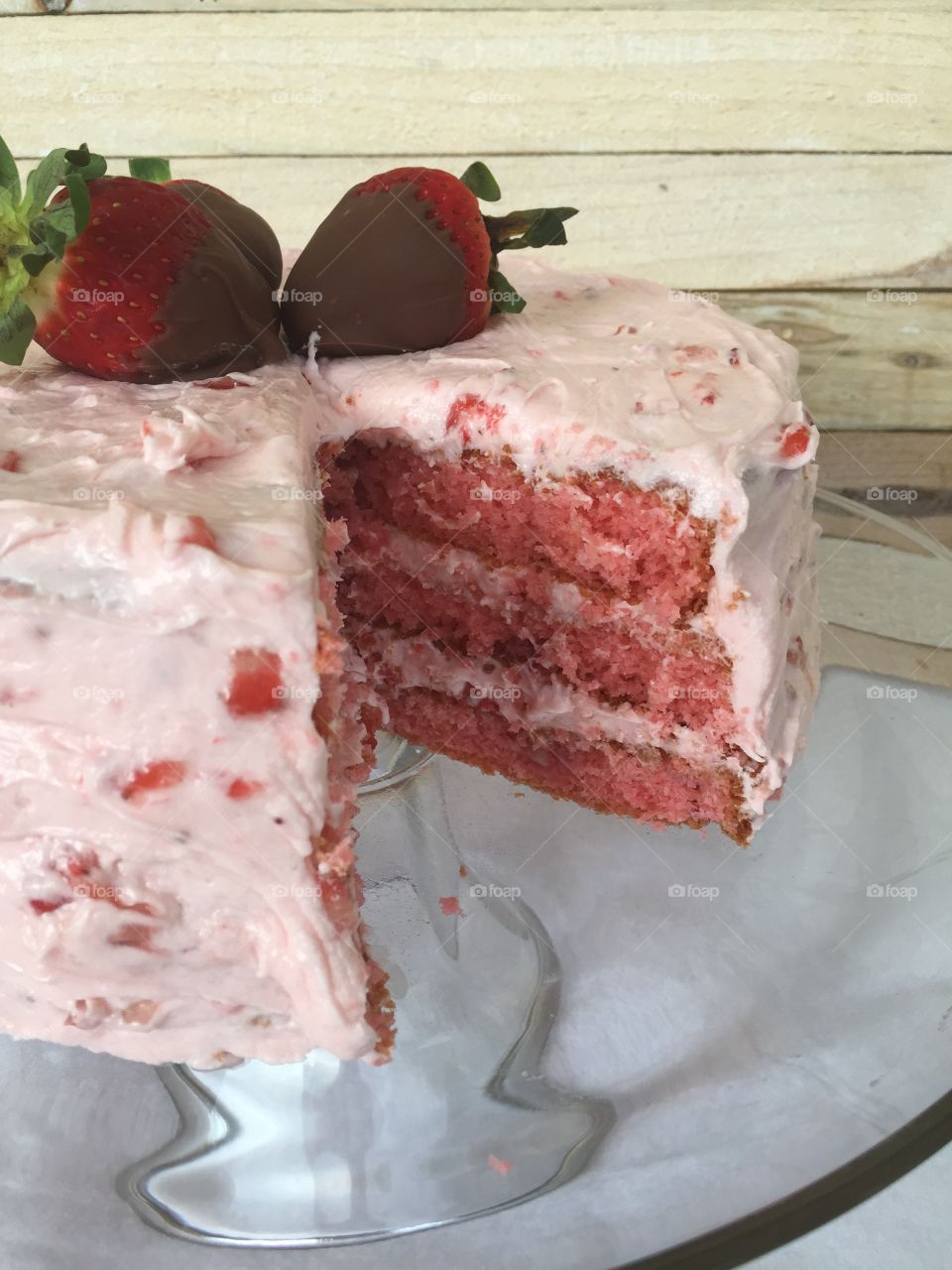 Strawberry triple layer cake with strawberry buttercream frosting