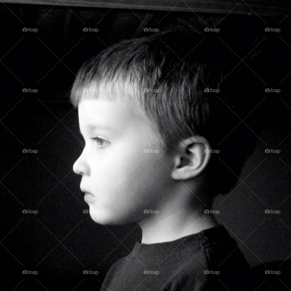 light dark window boy by indescribable