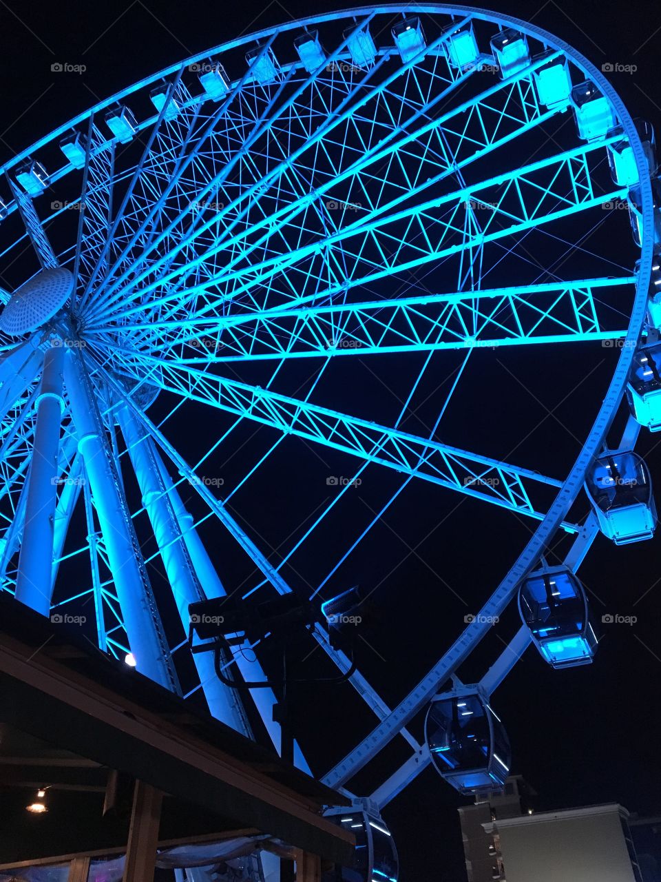 Bright colored Ferris wheel 
