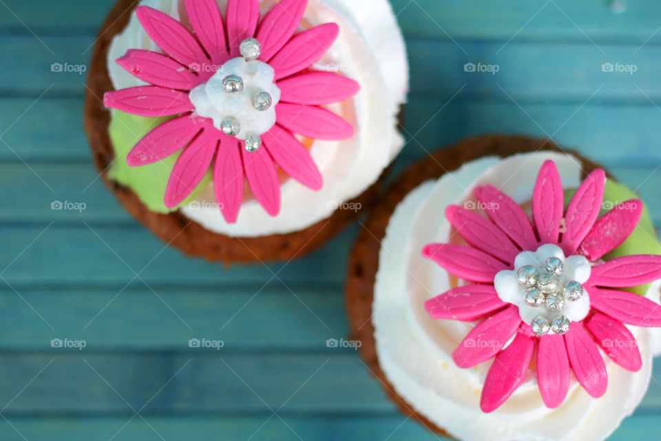 Crazy cupcakes, muffins, a cupcake, a bright cupcake, a cupcake with cream, Cake, sweetness, dessert, cream, bright cake, sugar, delicious cake, flower, cake with flower, color, Fruitcake