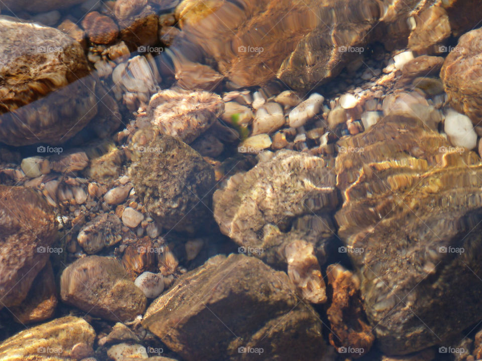 Cool water stream with pebbles