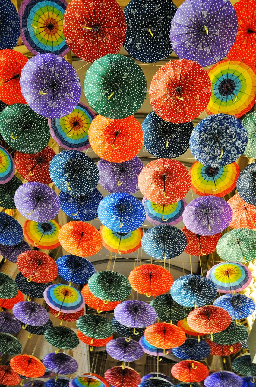 colorful multicolored and rainbow colors umbrellas in the mall in Dubai