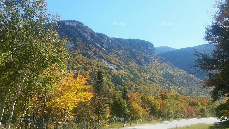 View of mountain and empty road in autumn