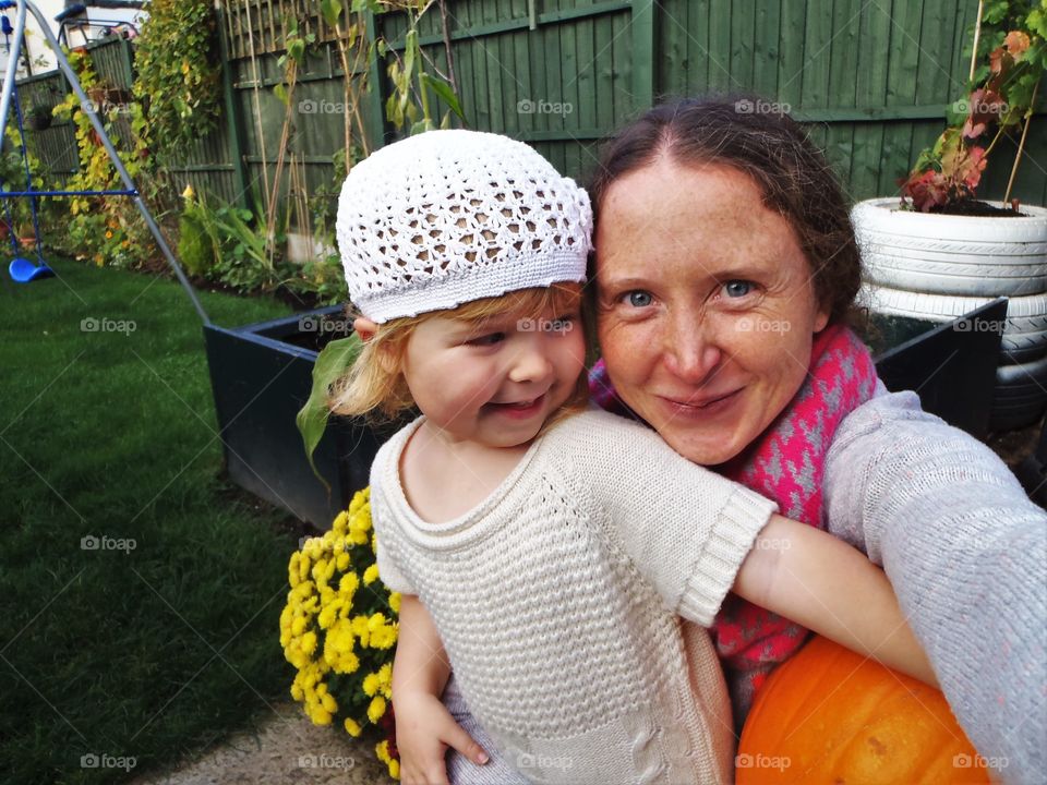 Mummy and daughter in fall