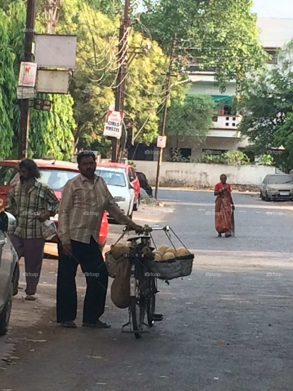 Vegetable Sale In Cycle. Man selling vegetables in cycle in morning 
