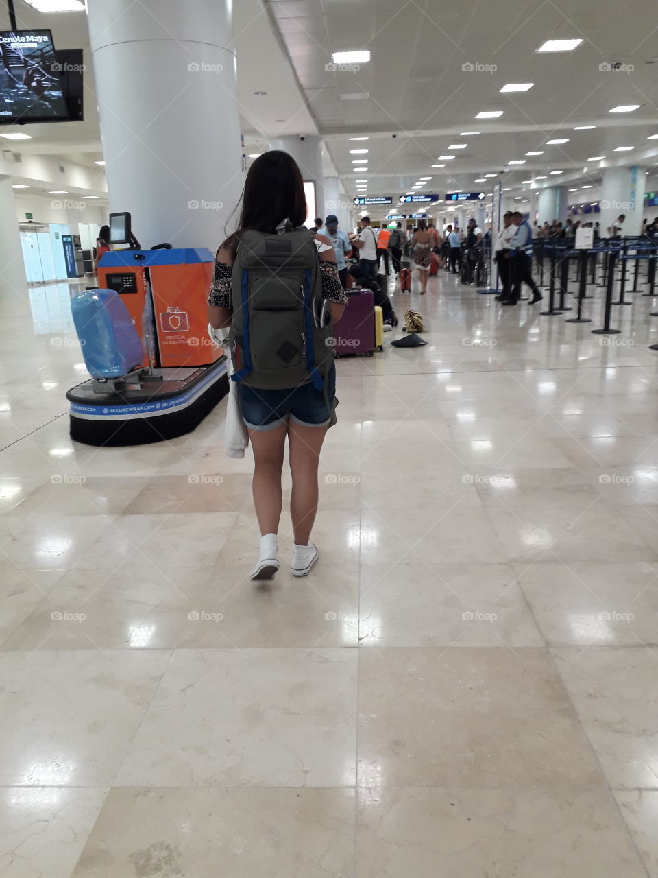 walking at the airport to travel