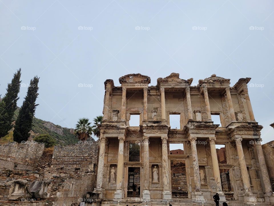 architectural history in Ephesus, Turkey, with pillars and statues