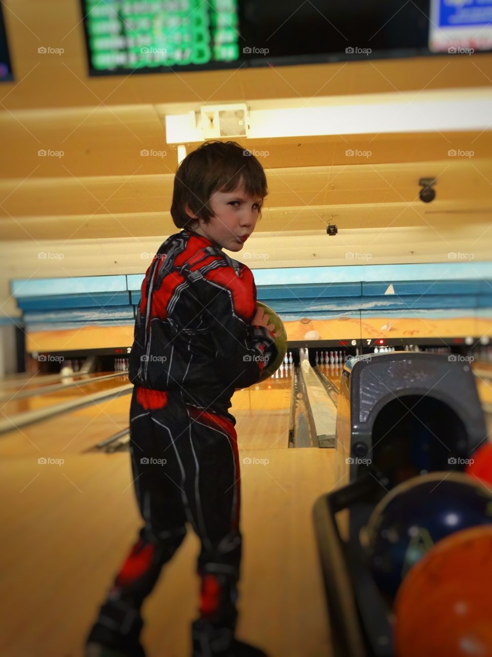 Boy With Bowling Ball