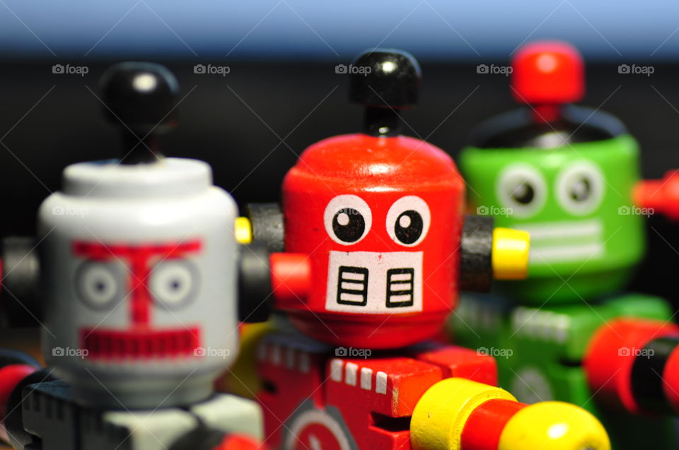 Closeup face of red wooden toy