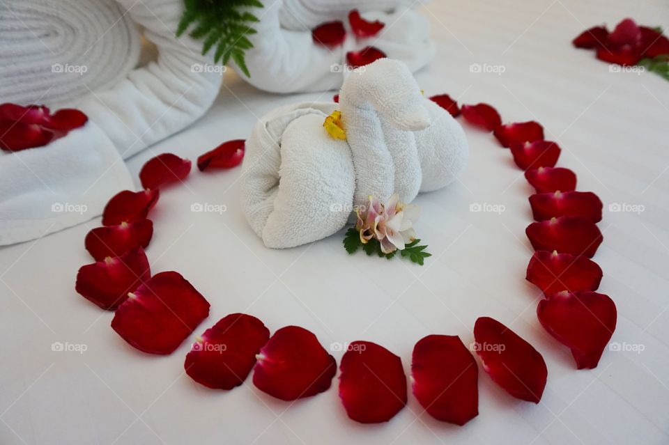 Honeymoon towel set up 
with rose