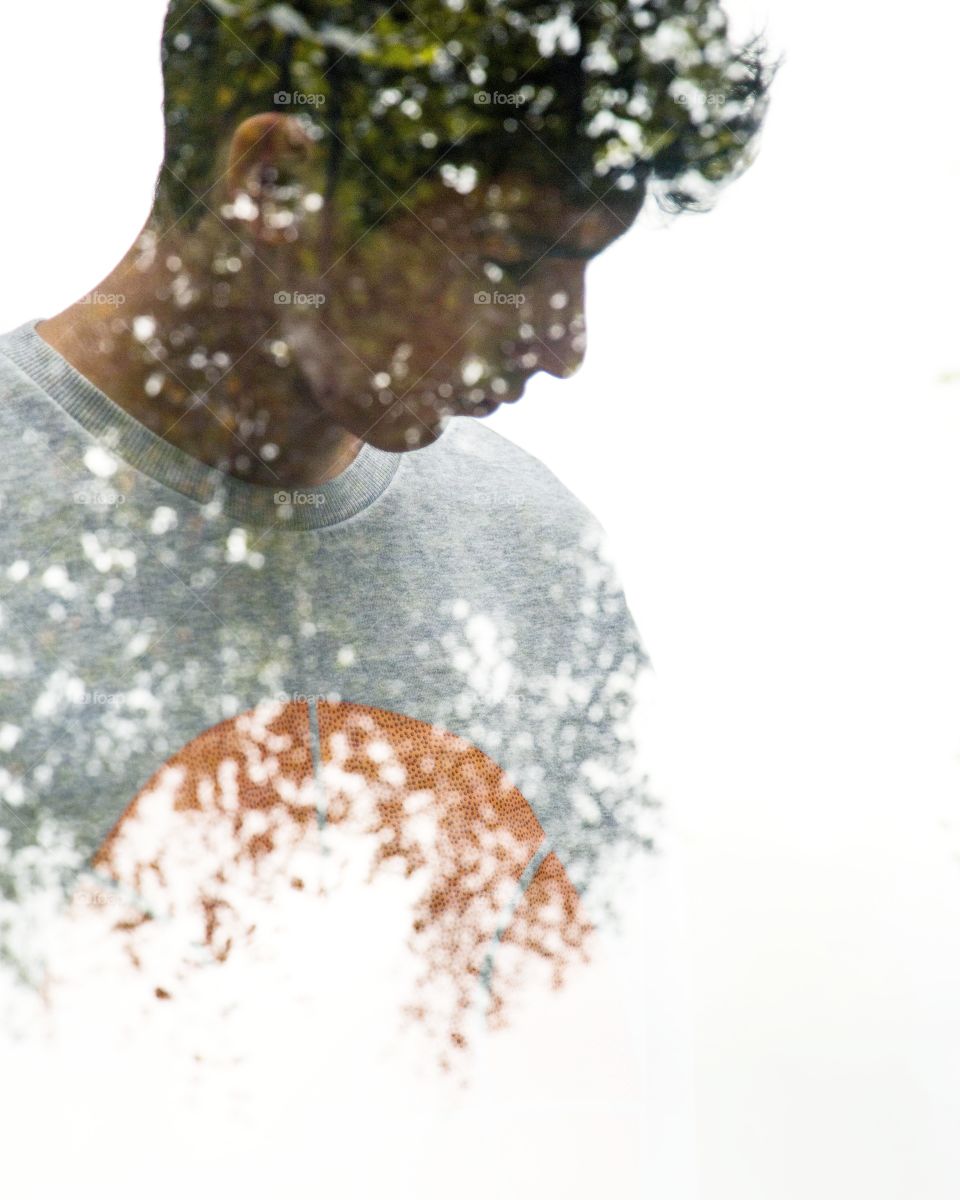 Double exposure of a young man