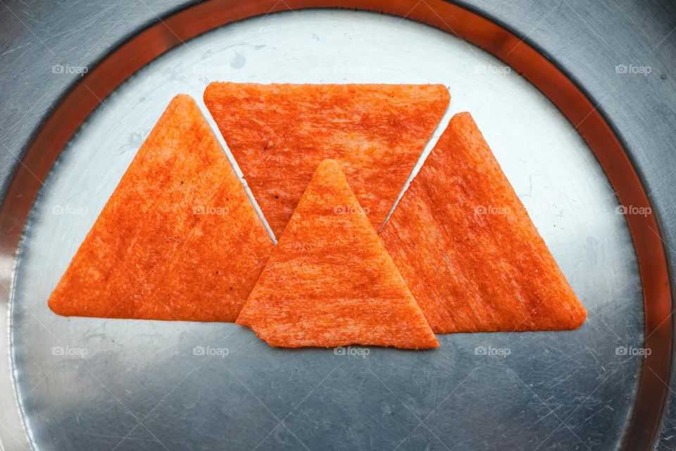 triangle shape chips on metal plate