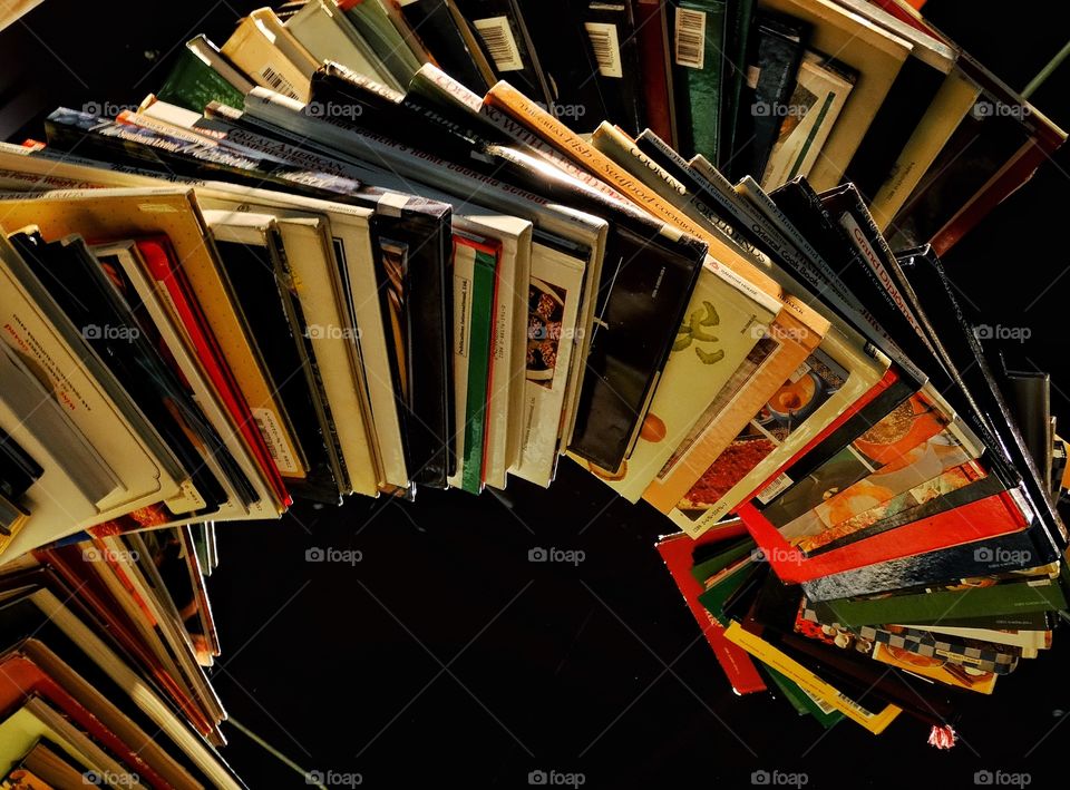 Stack Of Books. Stack Of Books Spiraling Into Infinity
