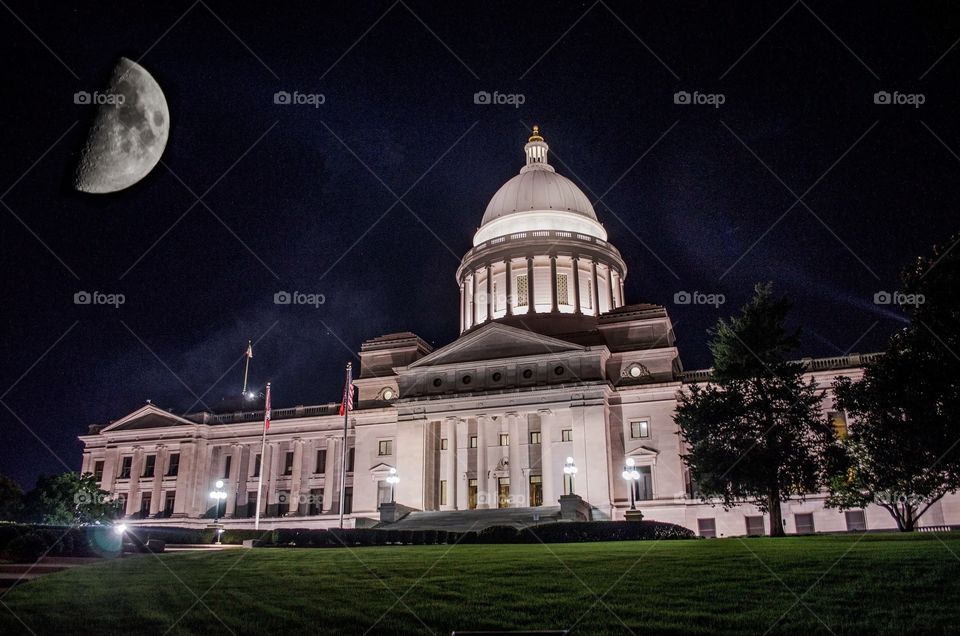 Little Rock state capital with a very omniscient moon hanging overhead 