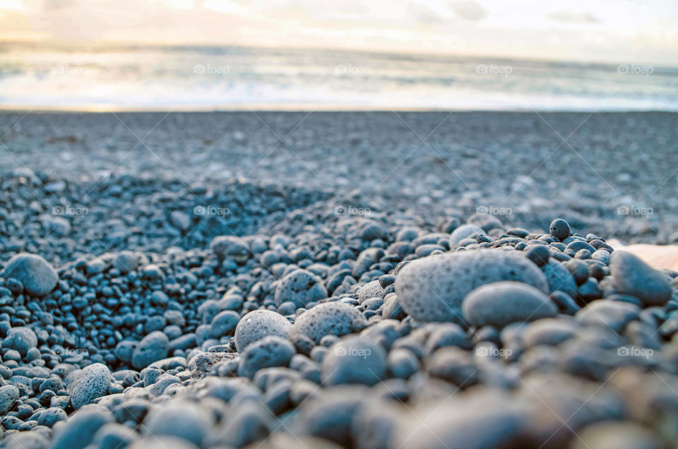 Close-up of stones on beach. Photo taken at Janubio beach (spa. Playa de Janubio) in Yaiza, Las Palmas, Spain.