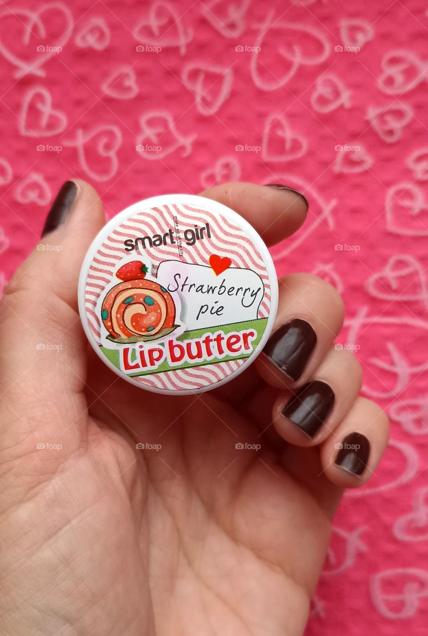 ip butter in the female hand beauty product