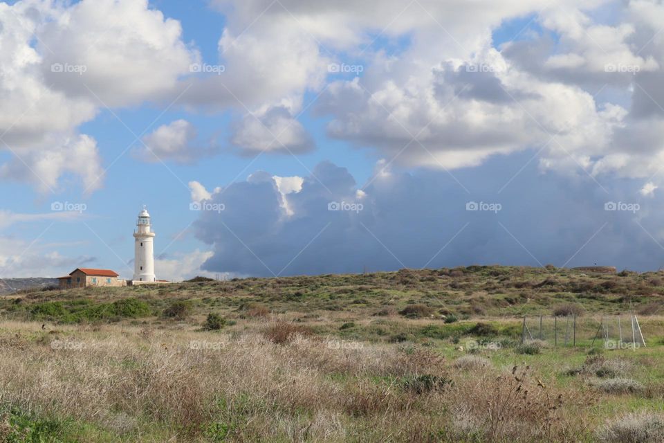 Lighthouse and clouds