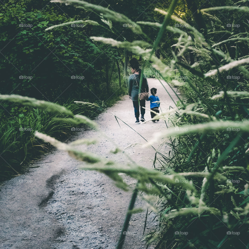 Mama exploring and teaching her son