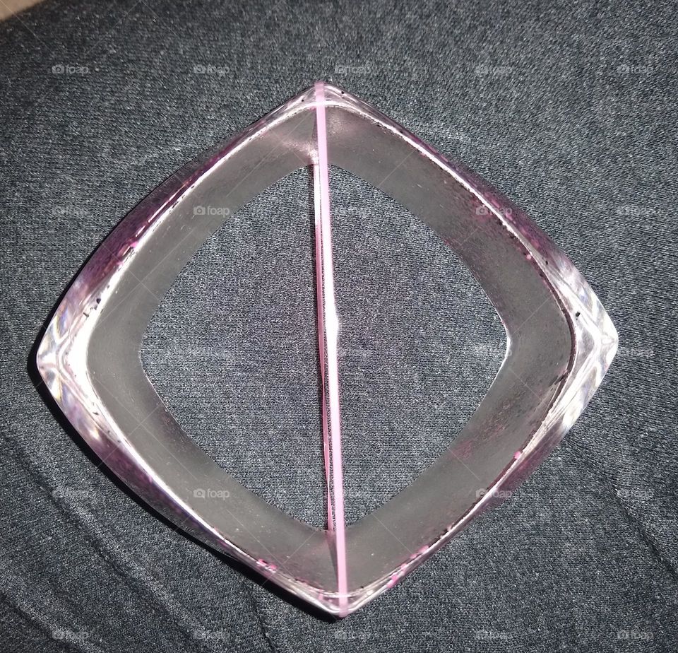 Double triangles found within square shaped bracelet