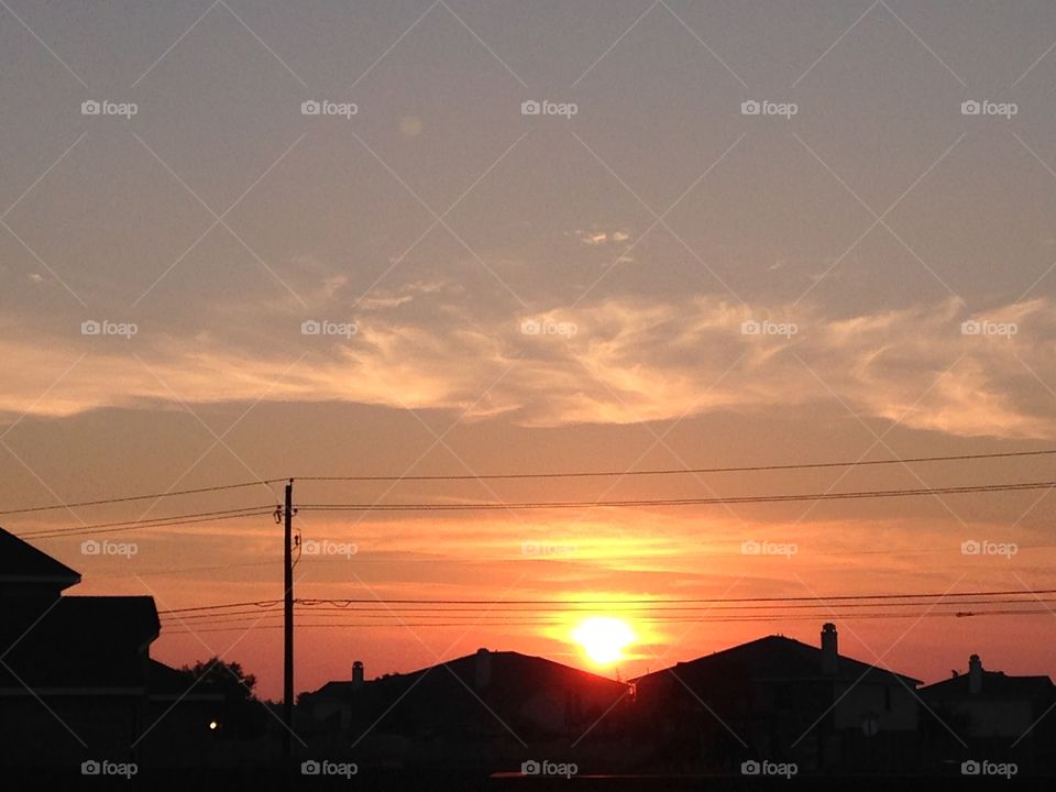 Sunrise and silhouettes. Beautiful sunrise and silhouettes of homes