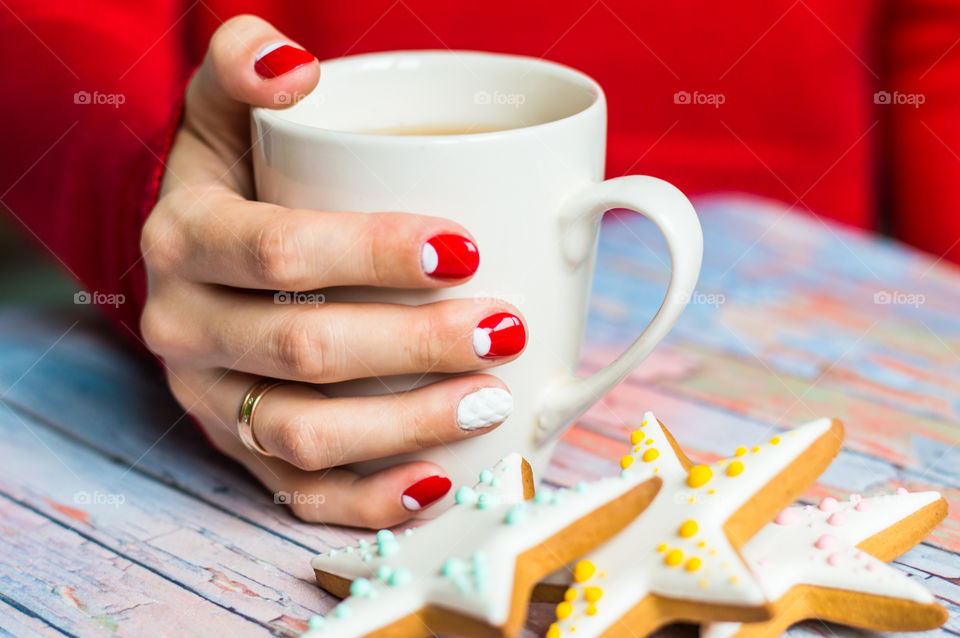 Women holding cup of a tea