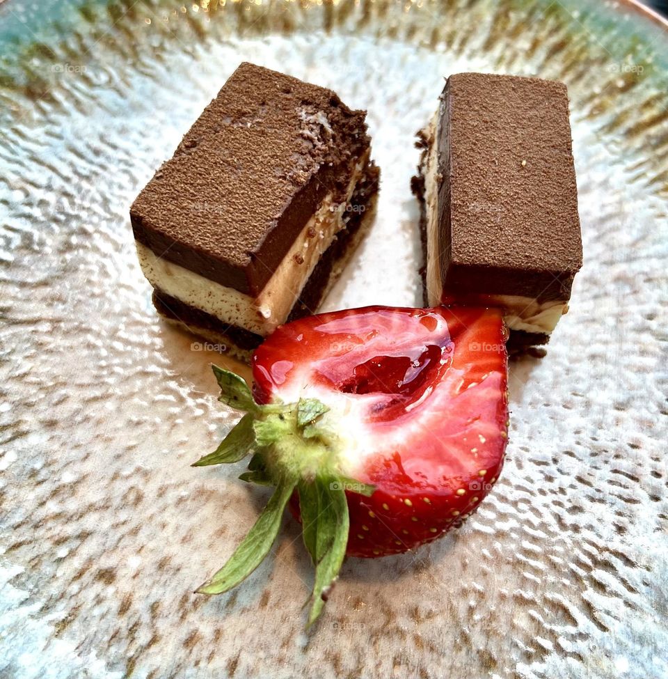 Chocolate brownie with strawberries