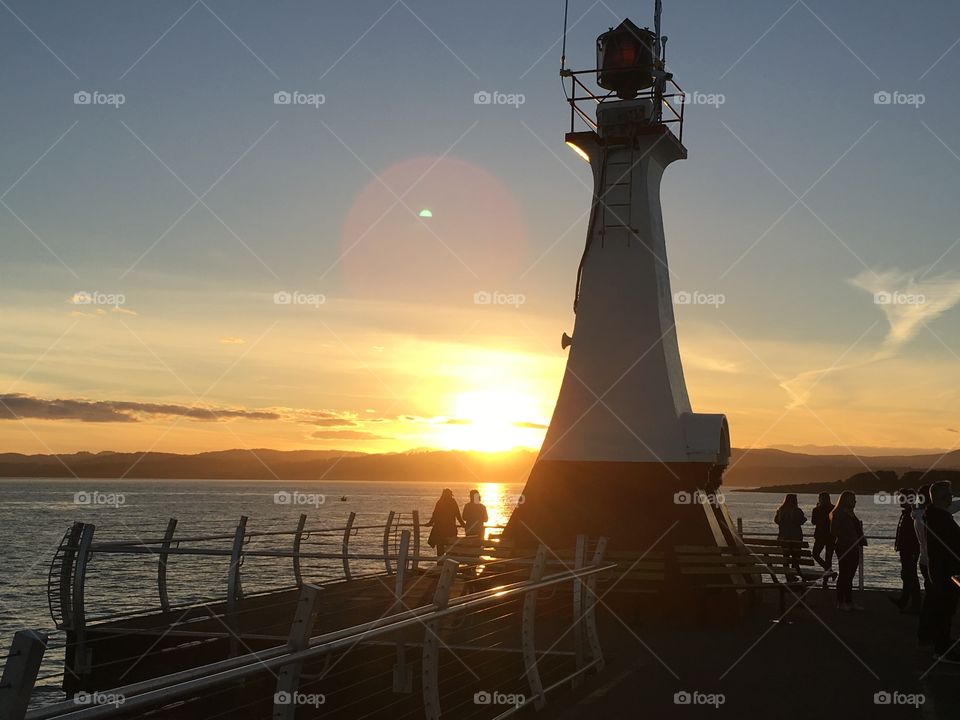 Sunset on breakwater