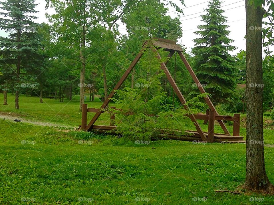 A frame bridge. Bridge along walking path in park
