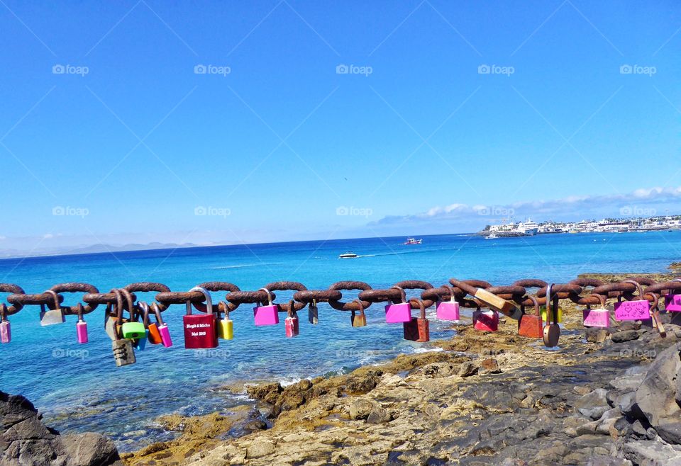 Close-up of love locks on chain