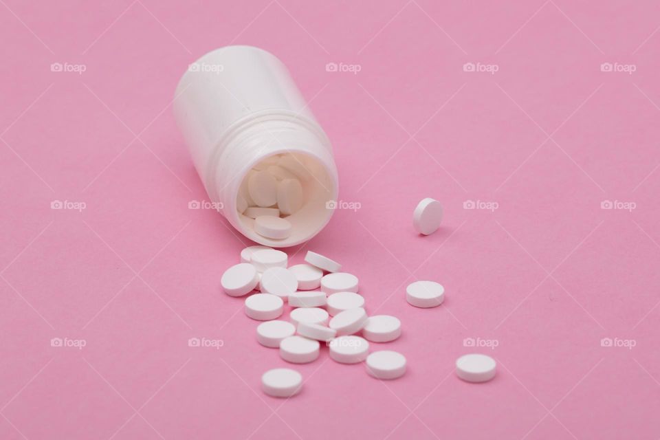 pills on pink