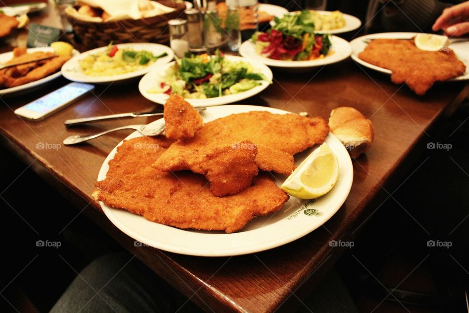 A delicious schnitzel and sides