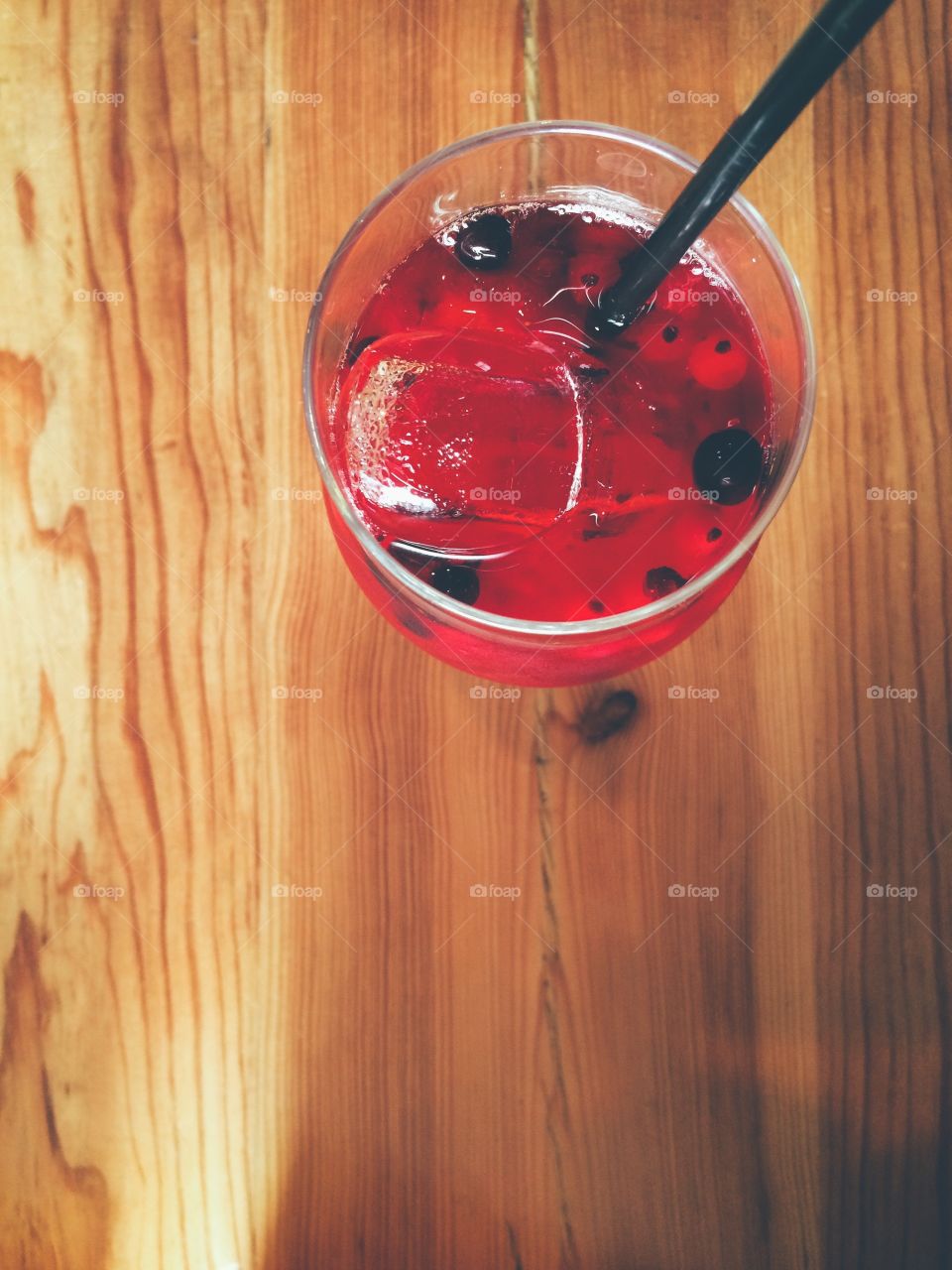 Red berries drink seen from above. 
