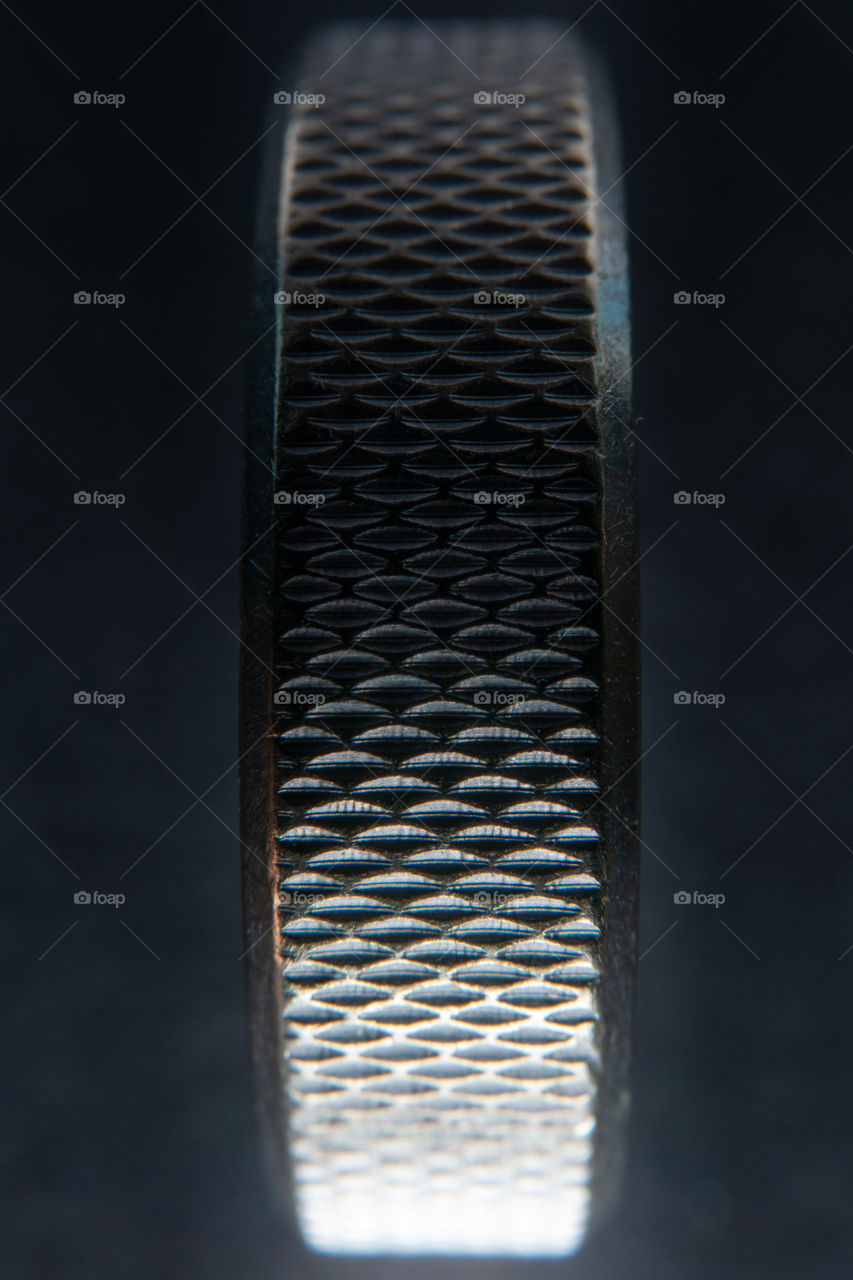 White gold ring close up. Macro shot of a gold ring pattern