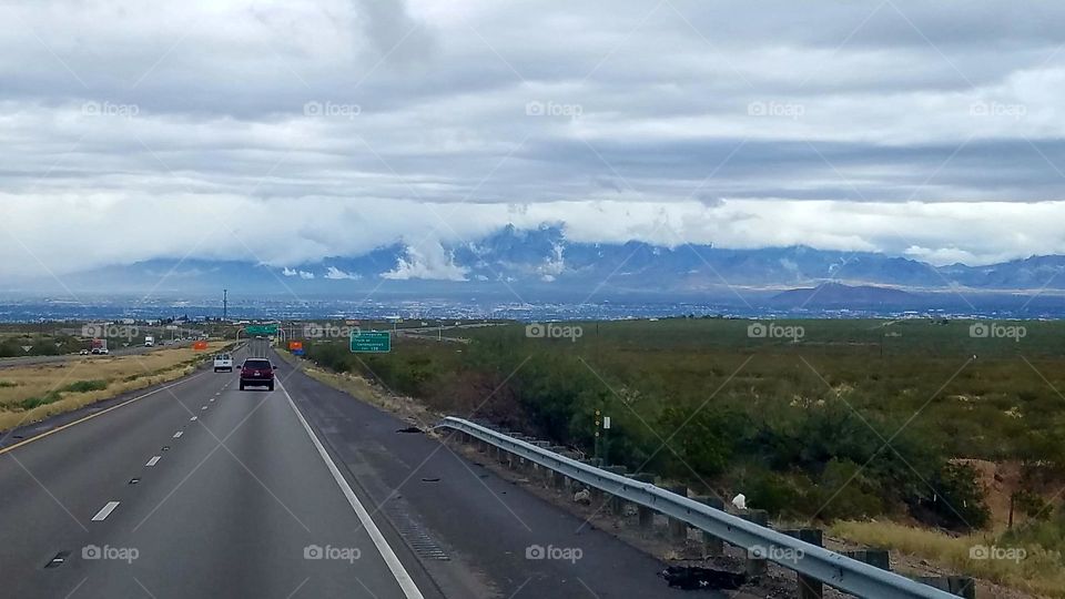 the clouds were pouring over the hills at Las Cruces New Mexico