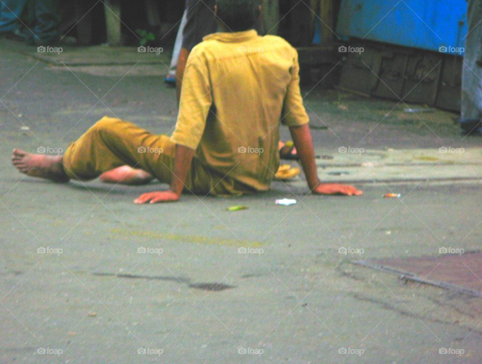 Street misery in India, Mumbai. An image that simultaneously represents despair and acceptance.