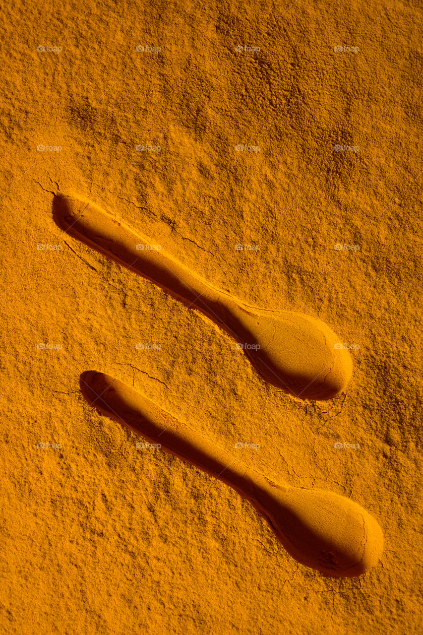 spoon impression on turmeric powder