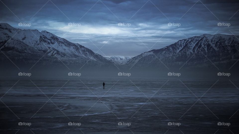 Solitude of person during stormy clouds