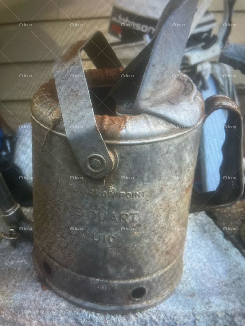 Photograph of a old style oil can