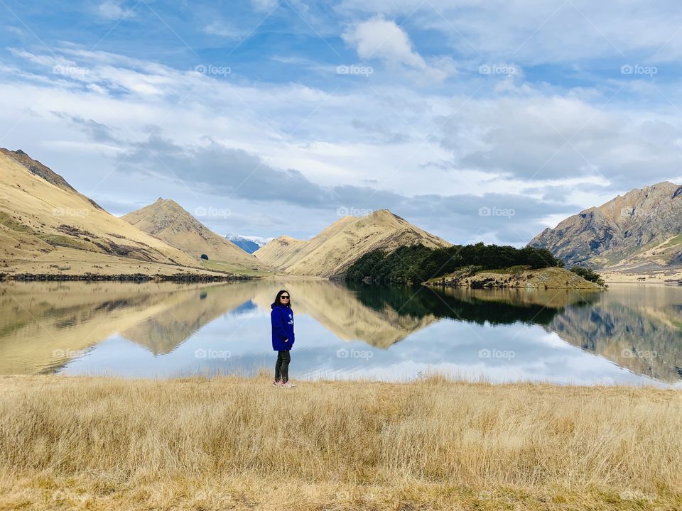 This picture was taken at Moke Lake located in Queenstown New Zealand. It was a clear sunny morning and the reflection on the lake was almost perfect!