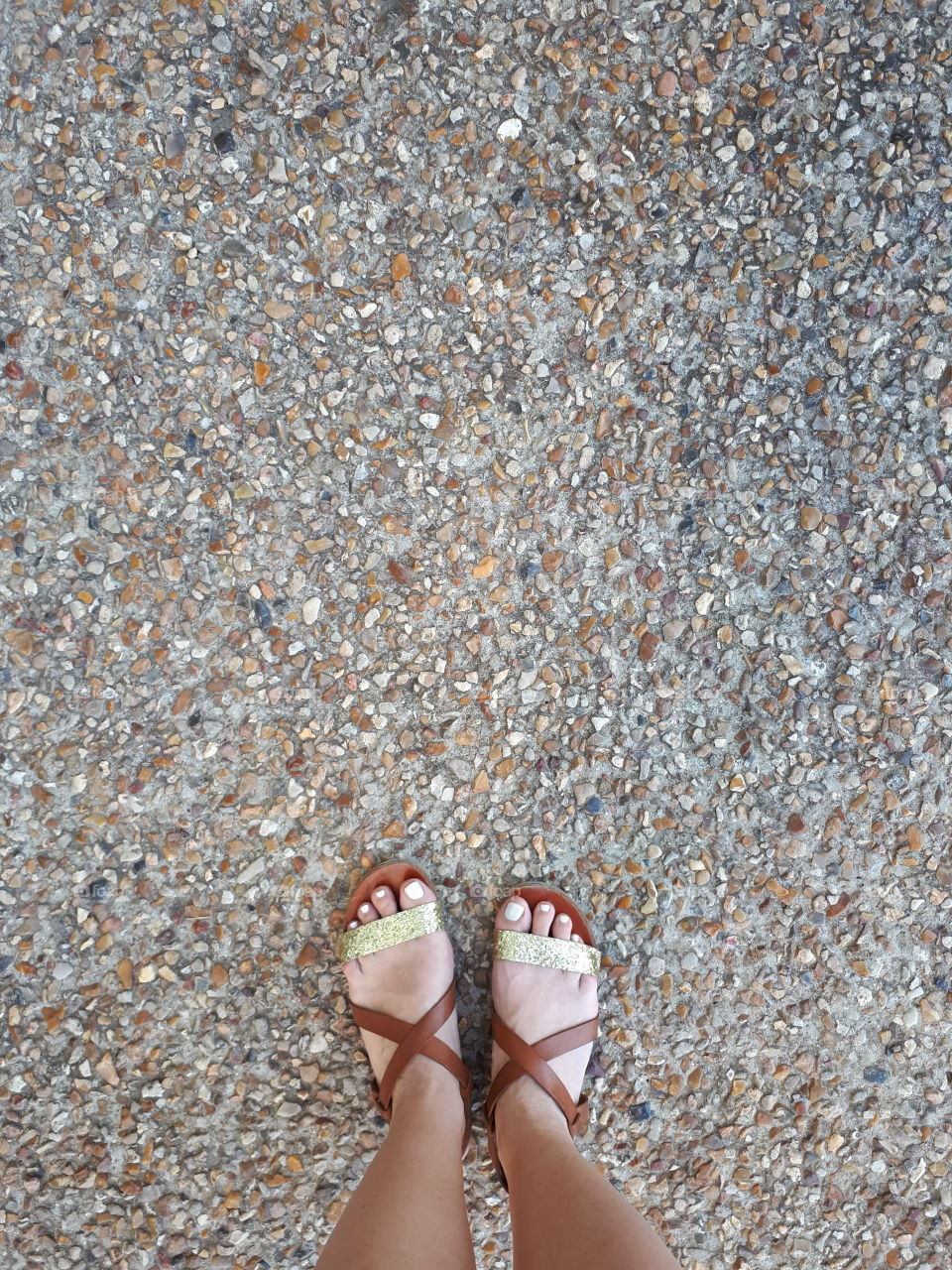 Woman's feet on the ground