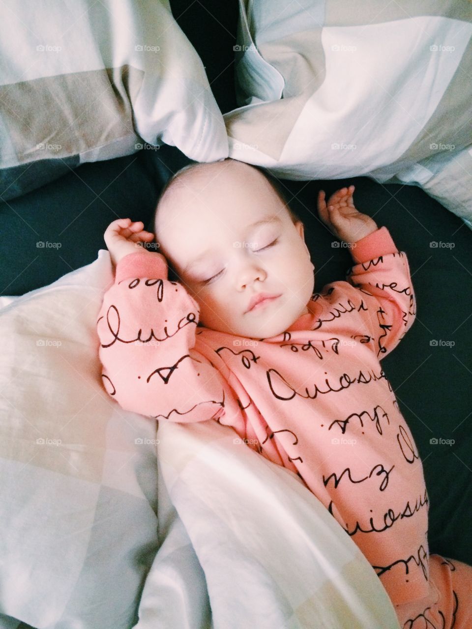 Cute sleeping baby-girl in pink underwear