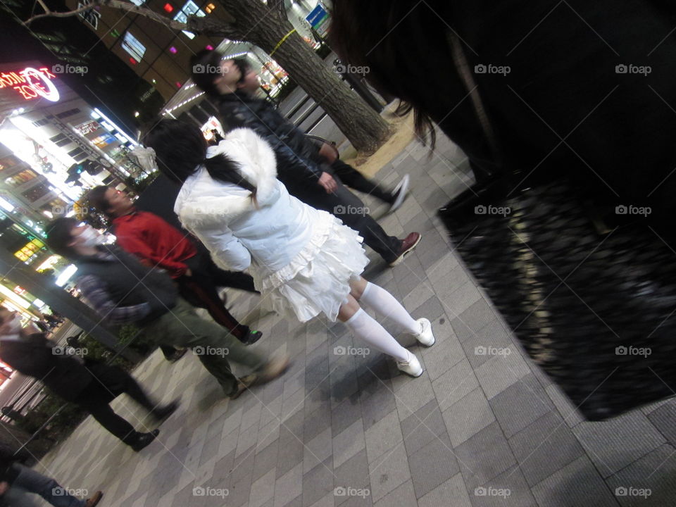 Akihabara, Tokyo, Japan. Maid from a Cafe Handing Ouy Flyers