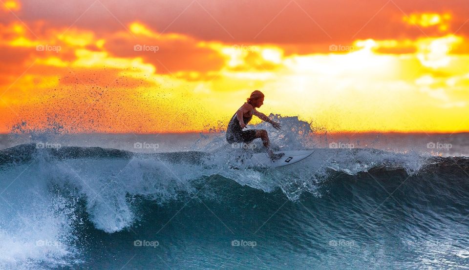 Sunset surfing